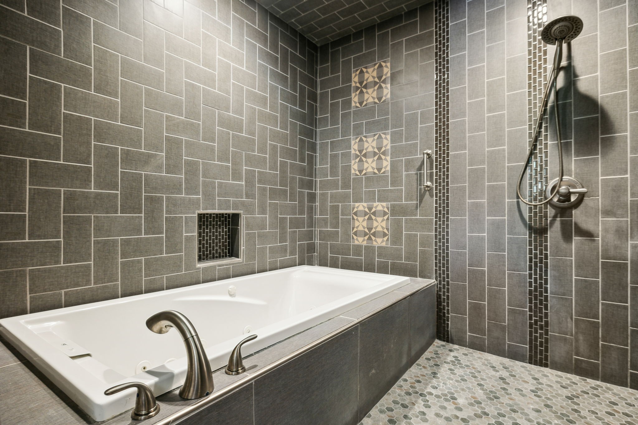 8166 Poplar Creek Road Nashville, TN 37221 - Photo 25 of 63 a bathroom with a bathtub and shower