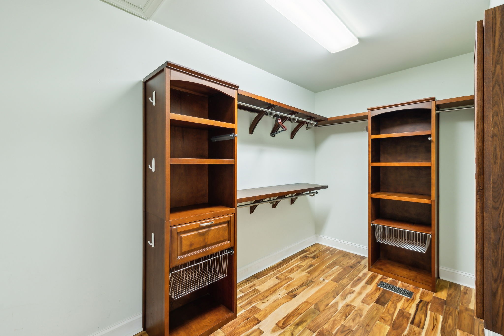 8166 Poplar Creek Road Nashville, TN 37221 - Photo 26 of 63 a view of walk in closet with empty racks