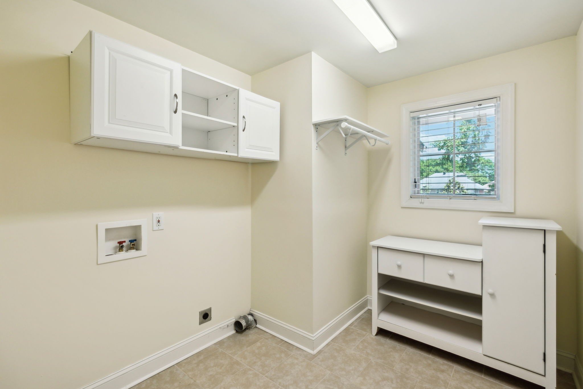 8166 Poplar Creek Road Nashville, TN 37221 - Photo 30 of 63 a view of an empty room with a window