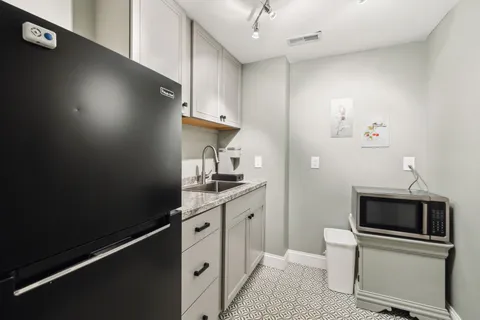 a view of a house with a big yard