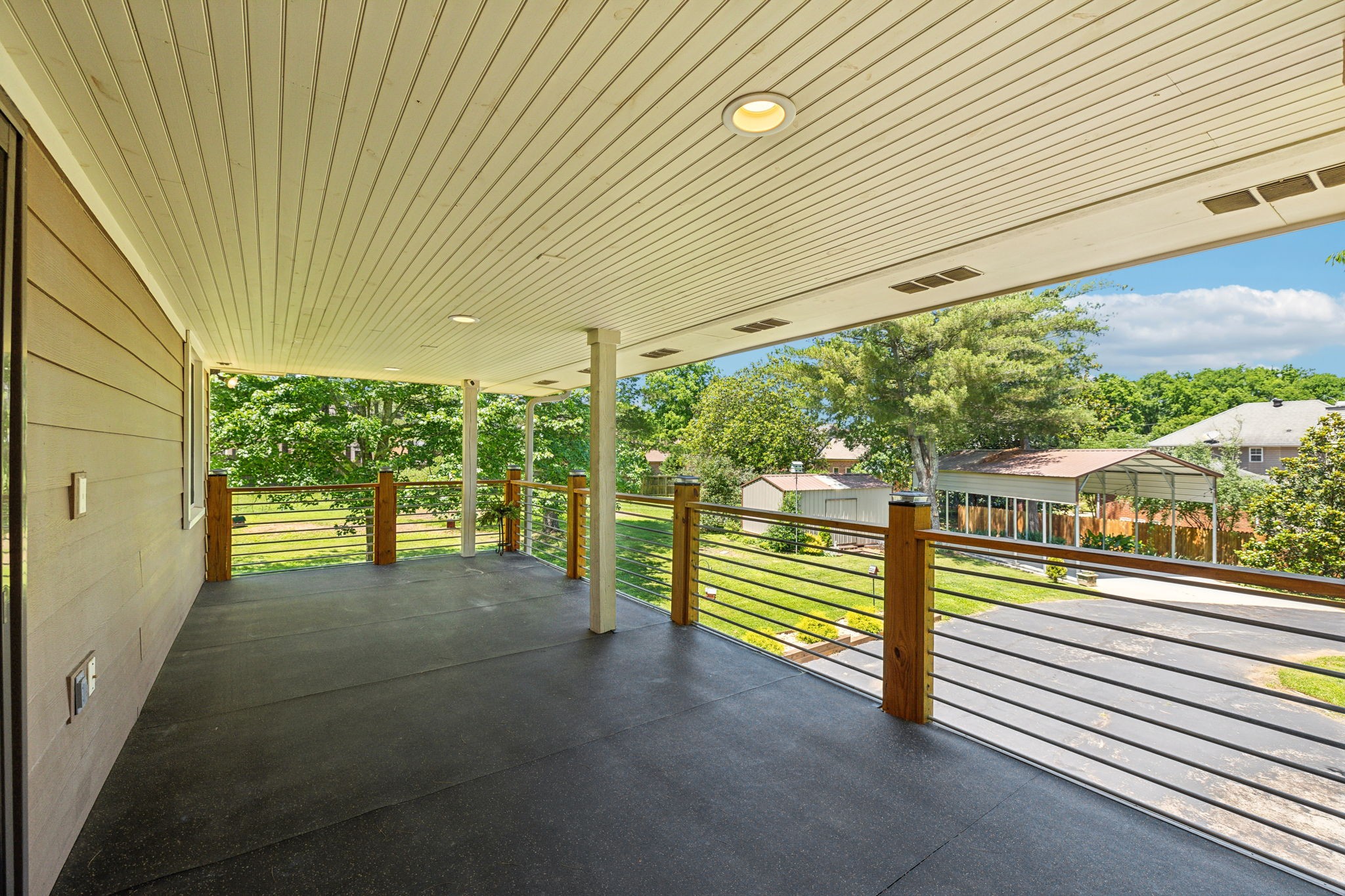 8166 Poplar Creek Road Nashville, TN 37221 - Photo 43 of 63 a view of a room with large windows