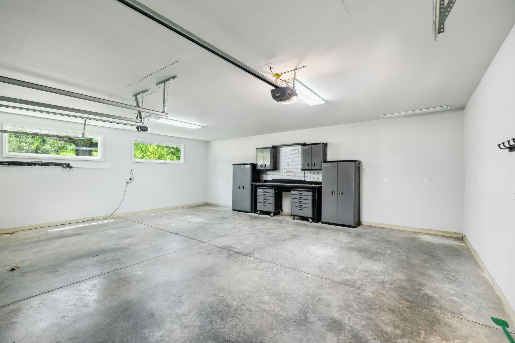 8166 Poplar Creek Road Nashville, TN 37221 - Photo 45 of 63 a view of an empty room with windows