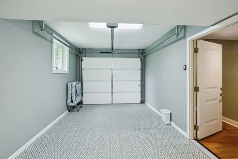 an aerial view of residential houses with outdoor space and mountain view