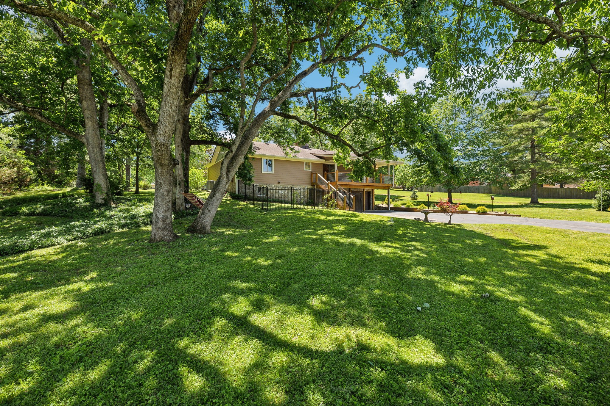8166 Poplar Creek Road Nashville, TN 37221 - Photo 51 of 63 a view of a house with a big yard