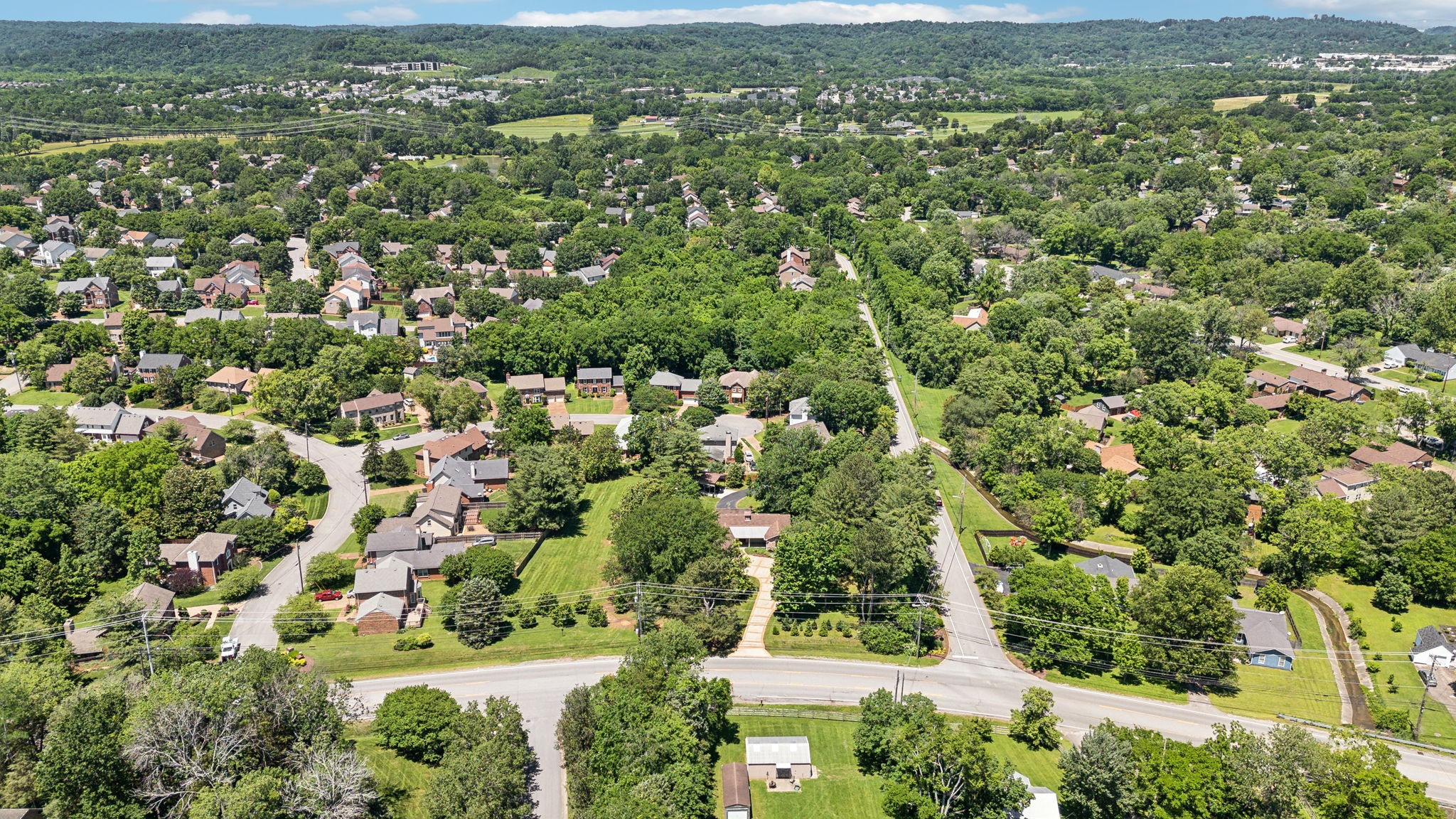 8166 Poplar Creek Road Nashville, TN 37221 - Photo 57 of 63 an aerial view of residential houses with outdoor space and mountain view