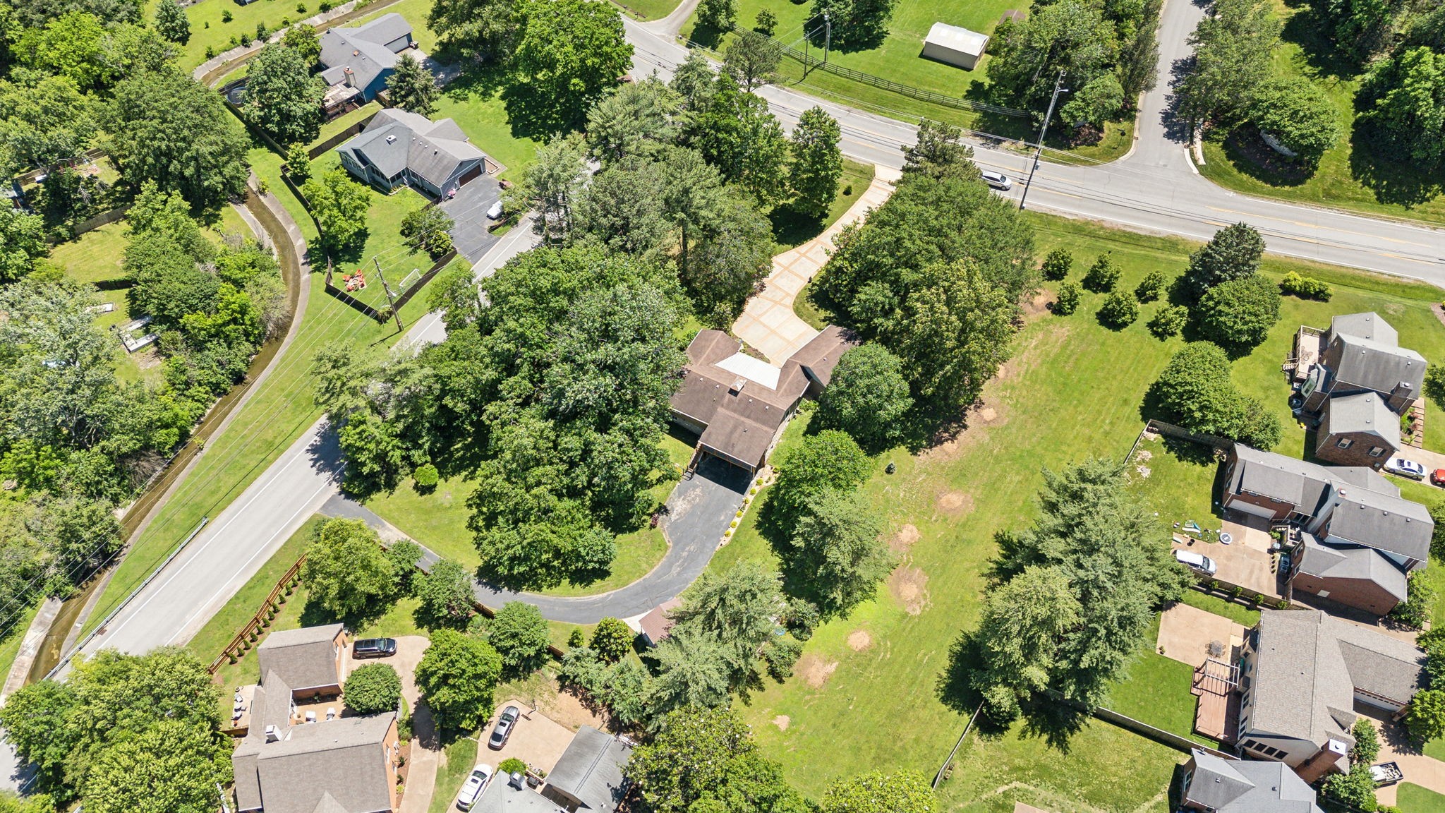 8166 Poplar Creek Road Nashville, TN 37221 - Photo 61 of 63 an aerial view of residential houses with outdoor space