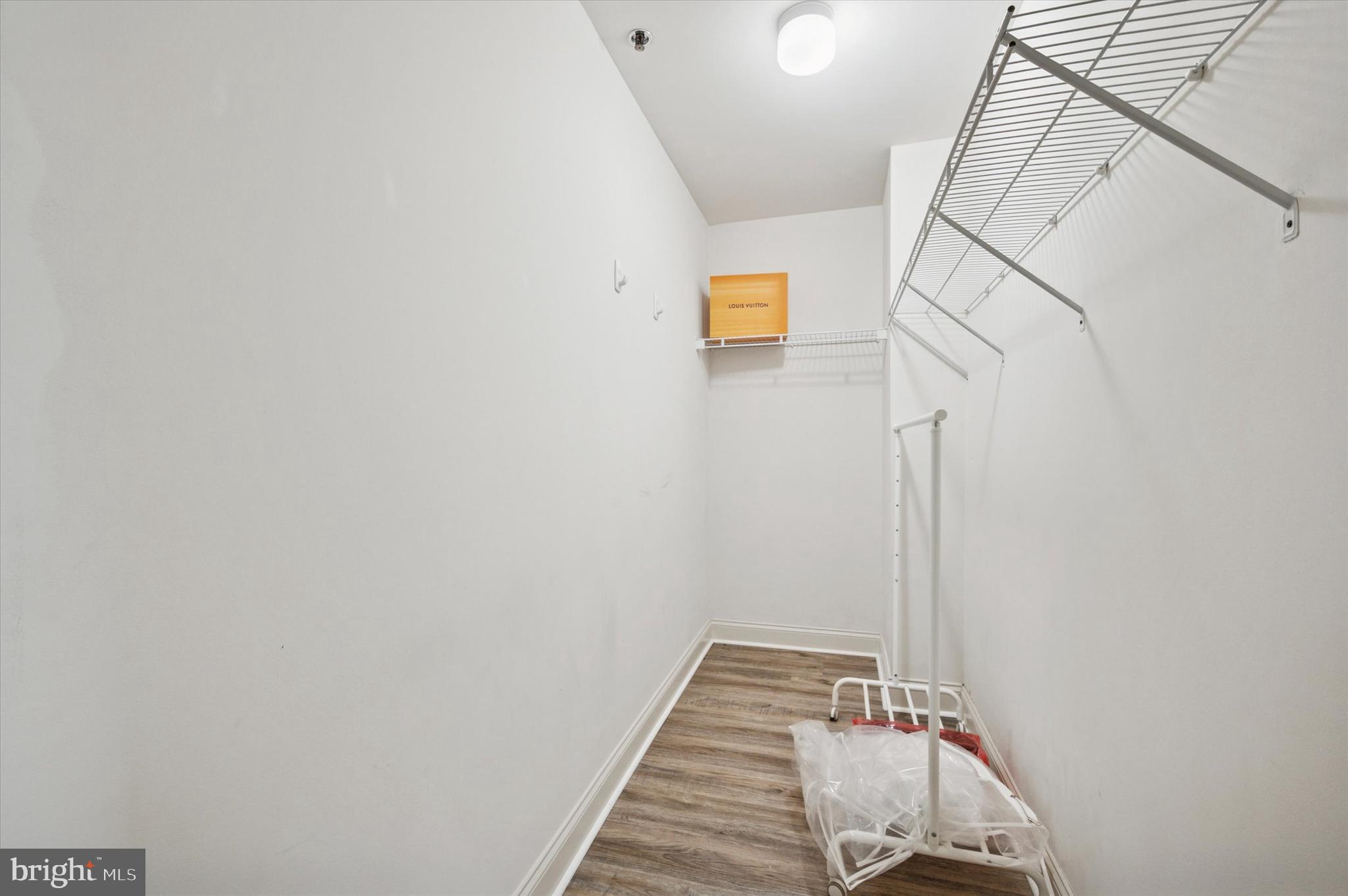 1001 Chestnut Street, Unit 904W Philadelphia, PA 19103 - Photo 20 of 25 a view of a room with rack on the wall