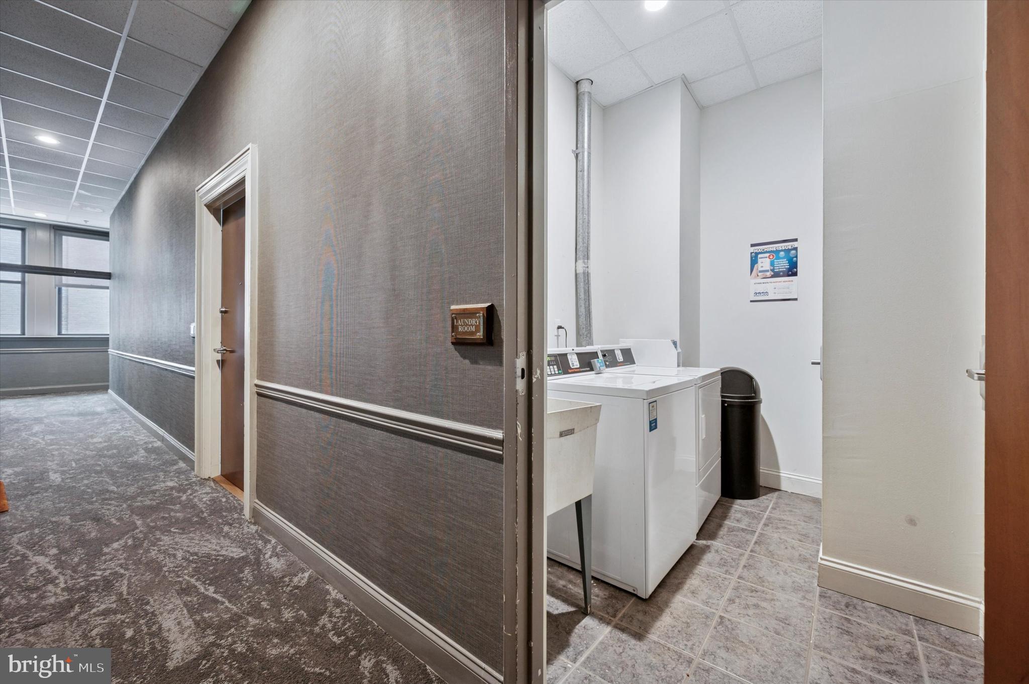 1001 Chestnut Street, Unit 904W Philadelphia, PA 19103 - Photo 23 of 25 a view of a hallway with white cabinets