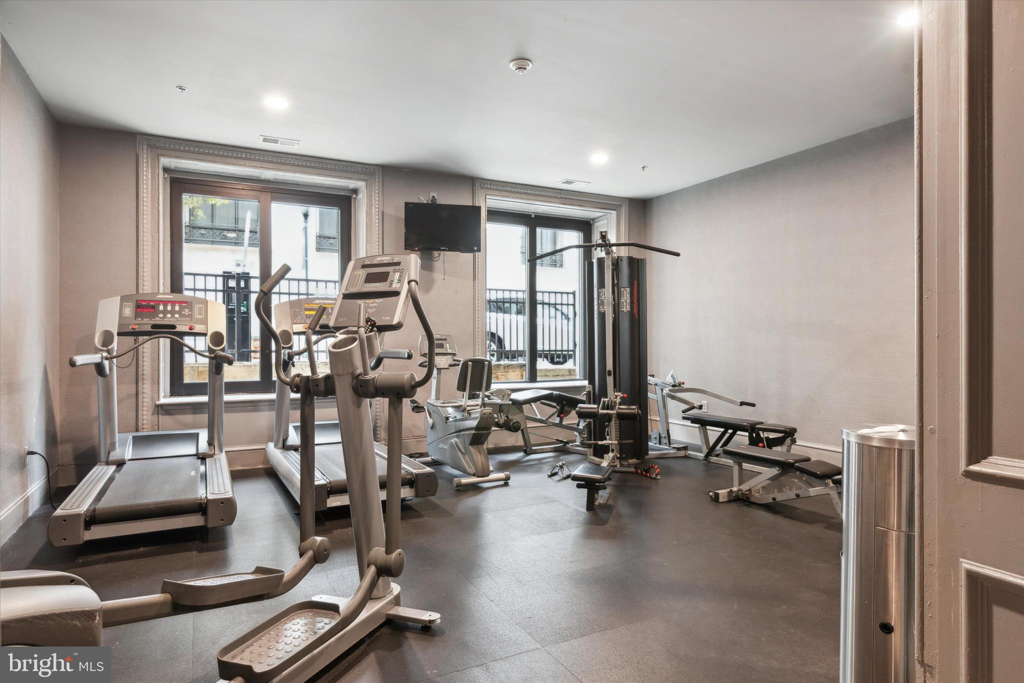 1001 Chestnut Street, Unit 904W Philadelphia, PA 19103 - Photo 24 of 25 a view of a room with gym equipment