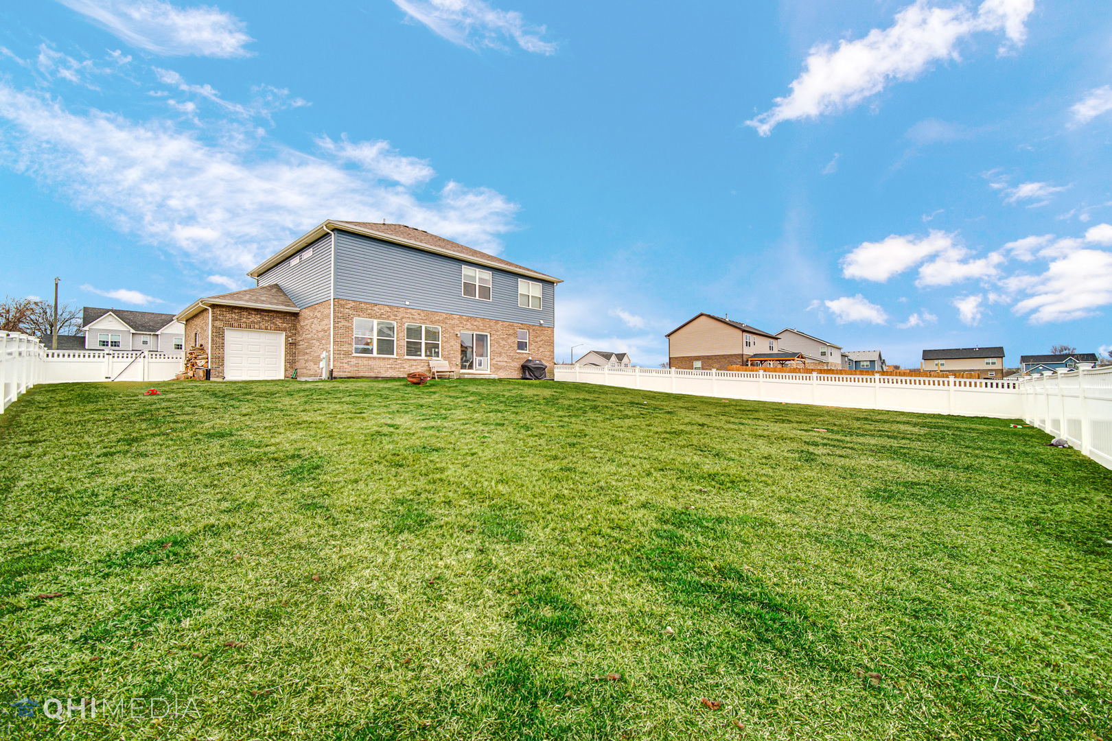 1636 Edentenny Road New Lenox, IL 60451 - Photo 18 of 19 a view of a house with a yard and garage