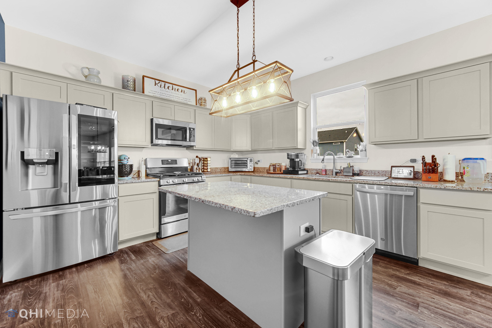 1636 Edentenny Road New Lenox, IL 60451 - Photo 3 of 19 a kitchen with stainless steel appliances granite countertop a refrigerator a sink dishwasher a stove and white cabinets with wooden floor