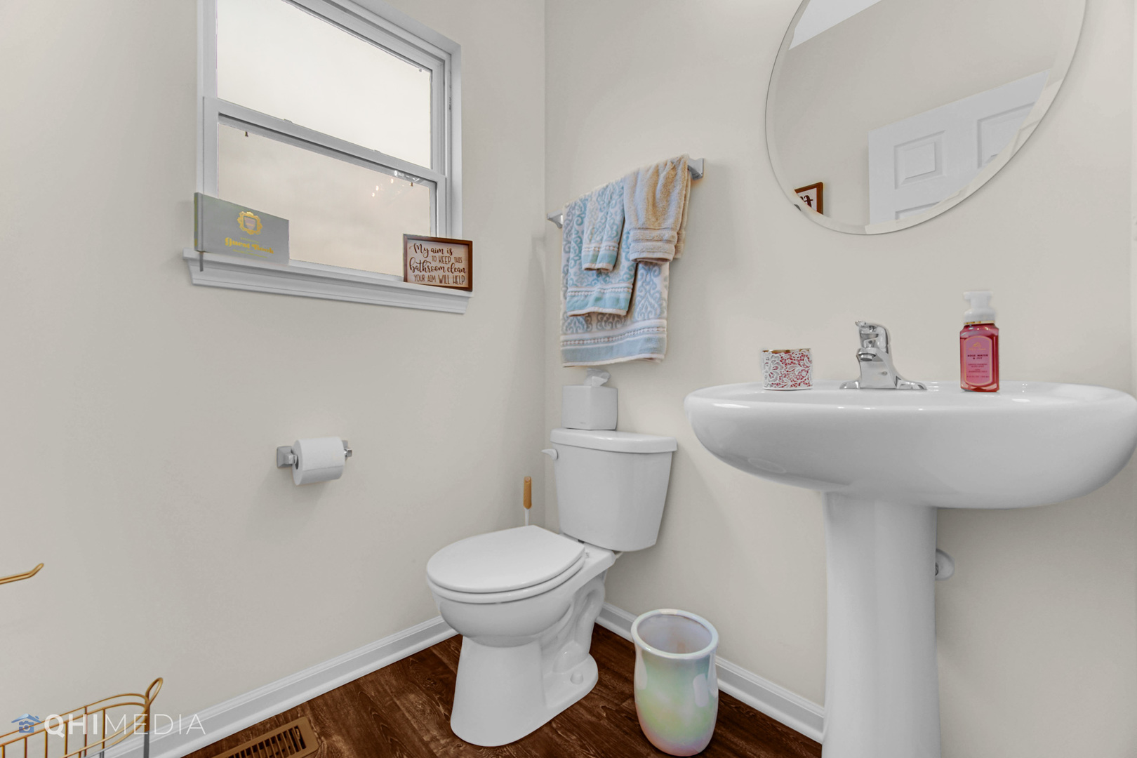 1636 Edentenny Road New Lenox, IL 60451 - Photo 7 of 19 a white toilet sitting next to a bathroom sink