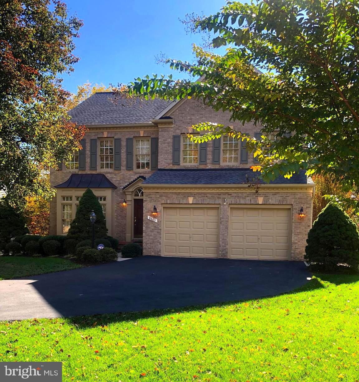8623 James Creek Drive Springfield, VA 22152 - Photo 2 of 69 a front view of a house with a yard