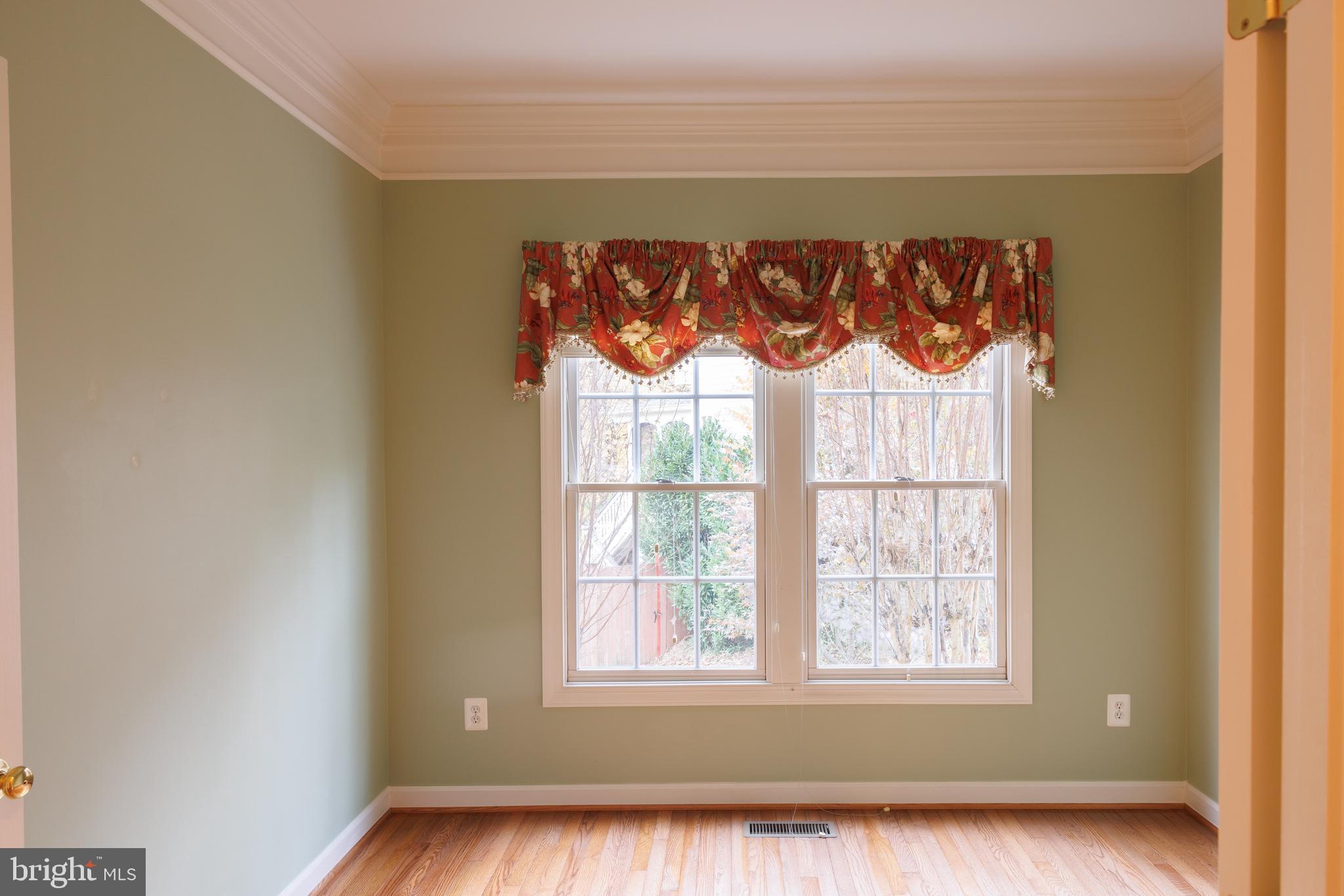8623 James Creek Drive Springfield, VA 22152 - Photo 30 of 69 a view of a room that has a window and a dresser