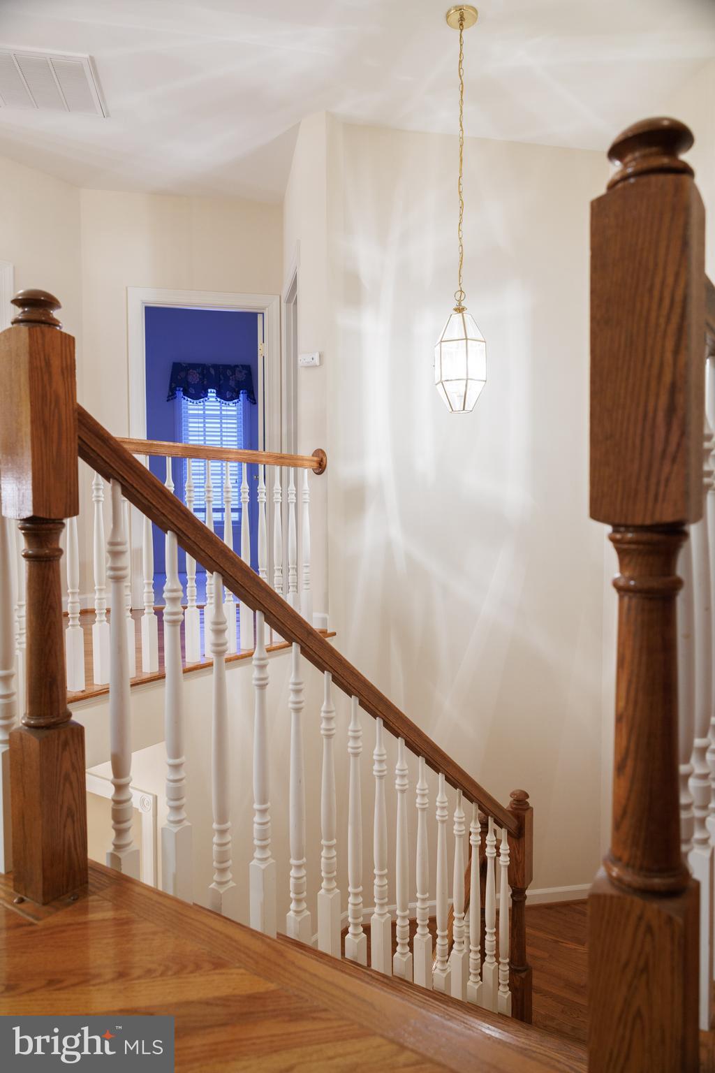 8623 James Creek Drive Springfield, VA 22152 - Photo 40 of 69 a view of a hallway with windows