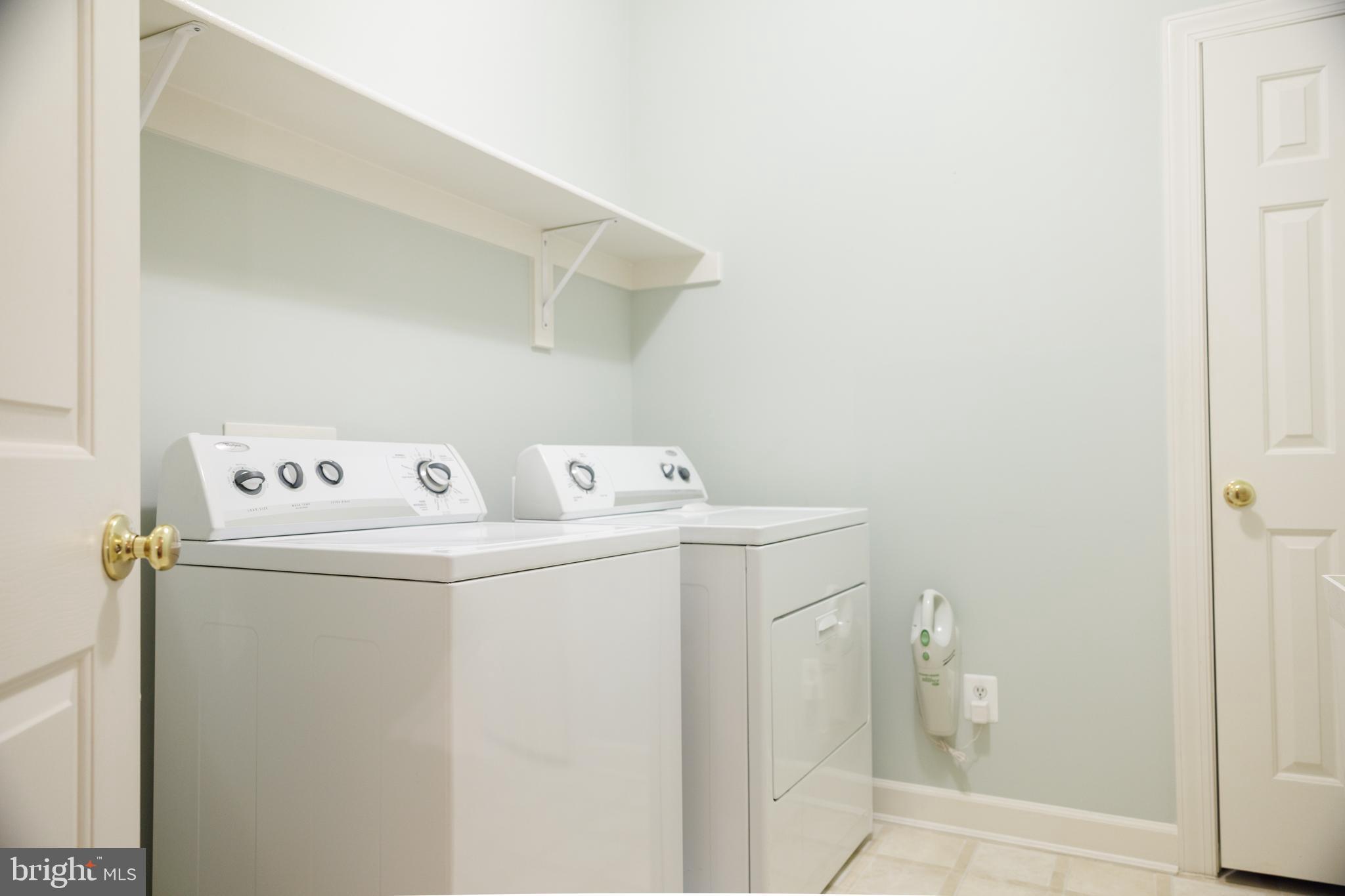 8623 James Creek Drive Springfield, VA 22152 - Photo 43 of 69 a utility room with dryer and washer