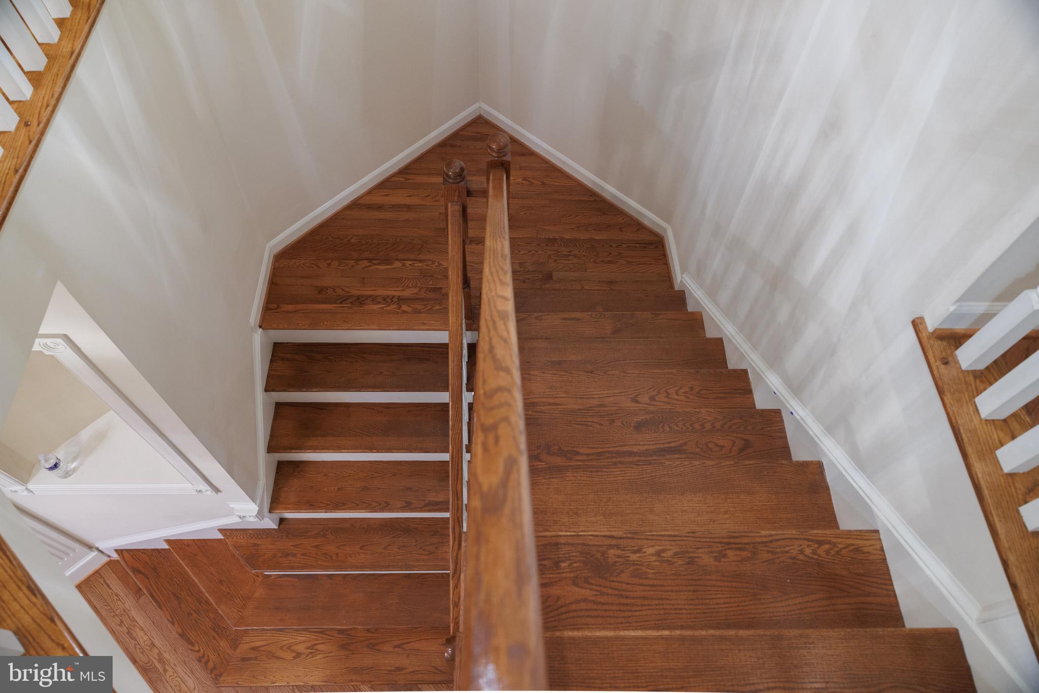8623 James Creek Drive Springfield, VA 22152 - Photo 51 of 69 a view of staircase with white walls and a window