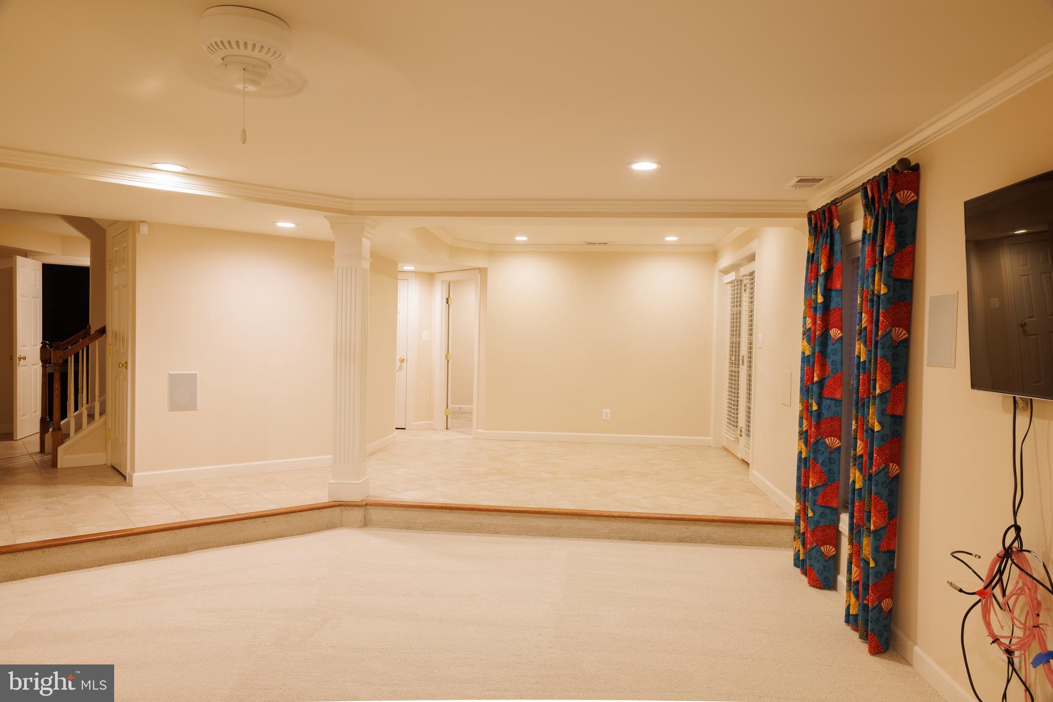 8623 James Creek Drive Springfield, VA 22152 - Photo 52 of 69 Large basement great room with new carpeting