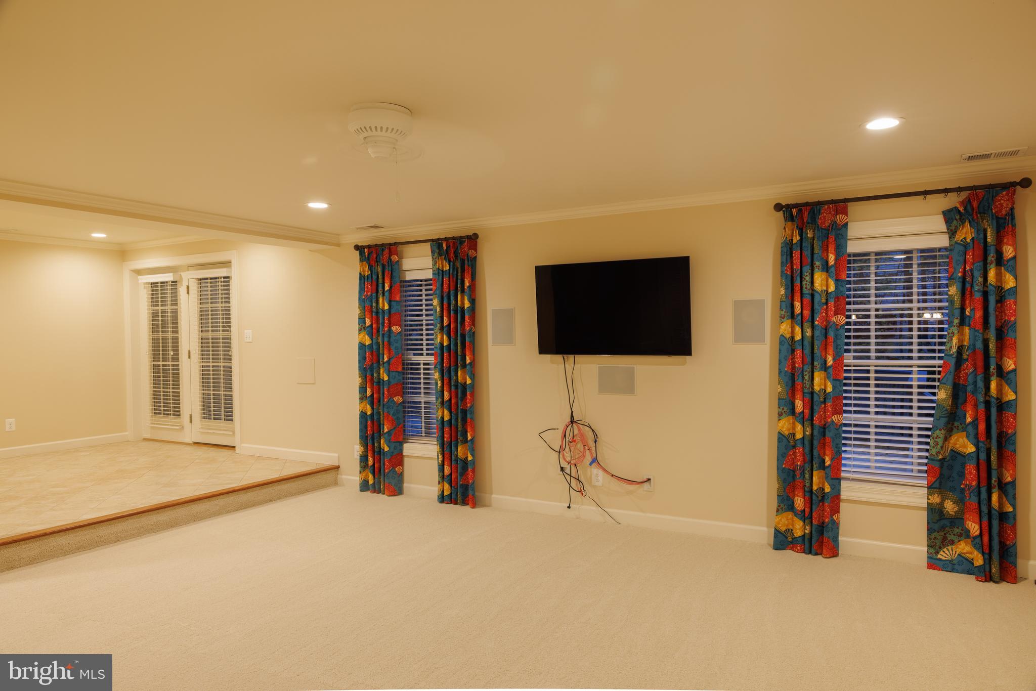 8623 James Creek Drive Springfield, VA 22152 - Photo 53 of 69 a view of a livingroom with furniture and gym equipment