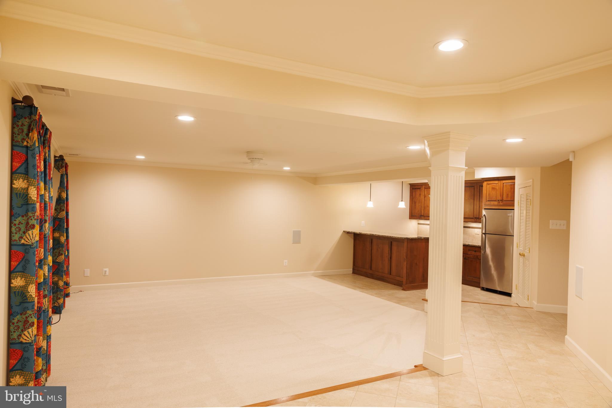 8623 James Creek Drive Springfield, VA 22152 - Photo 56 of 69 Porcelain tile throughout wet bar area