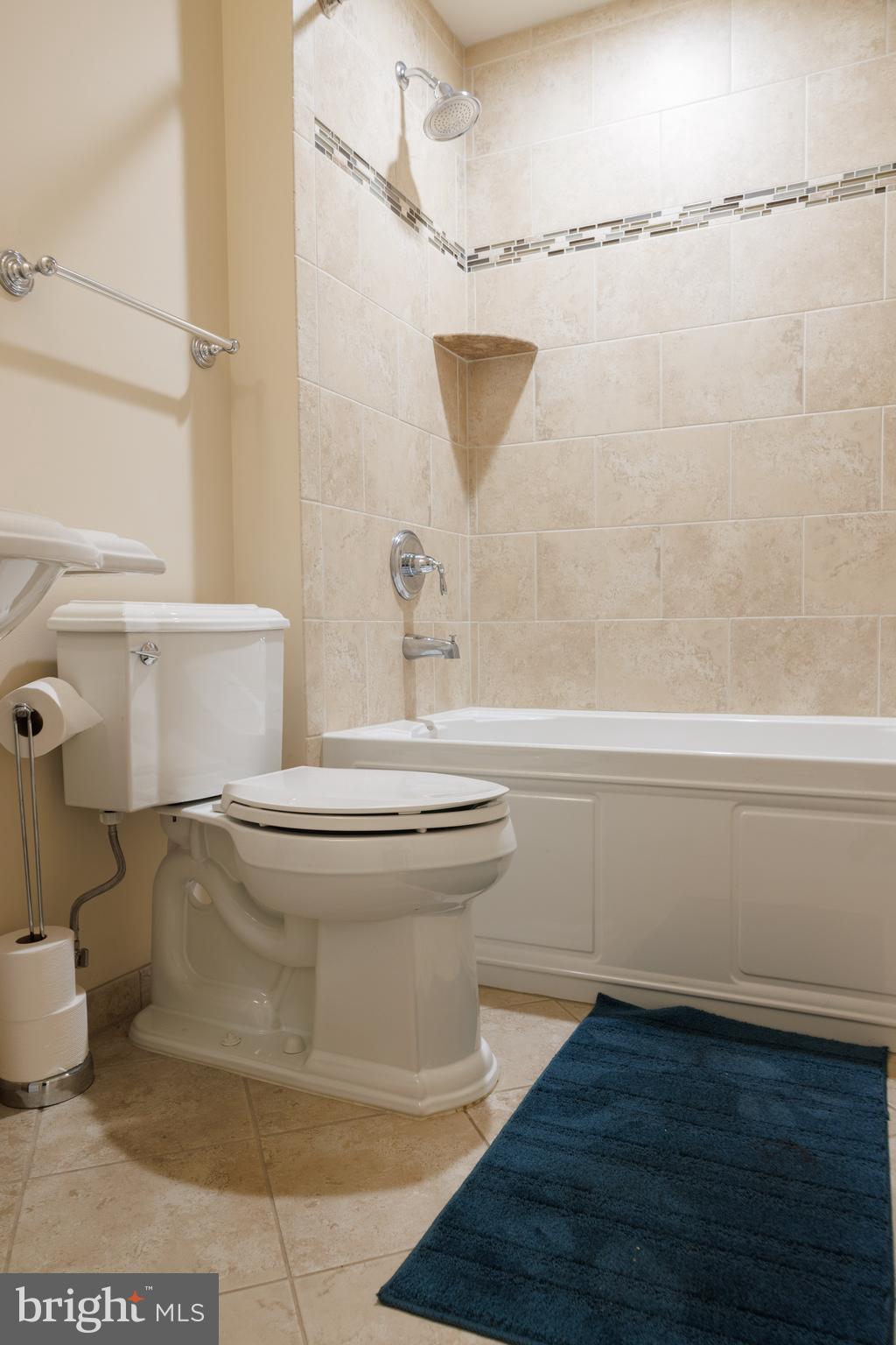 8623 James Creek Drive Springfield, VA 22152 - Photo 61 of 69 a bathroom with a toilet and a shower