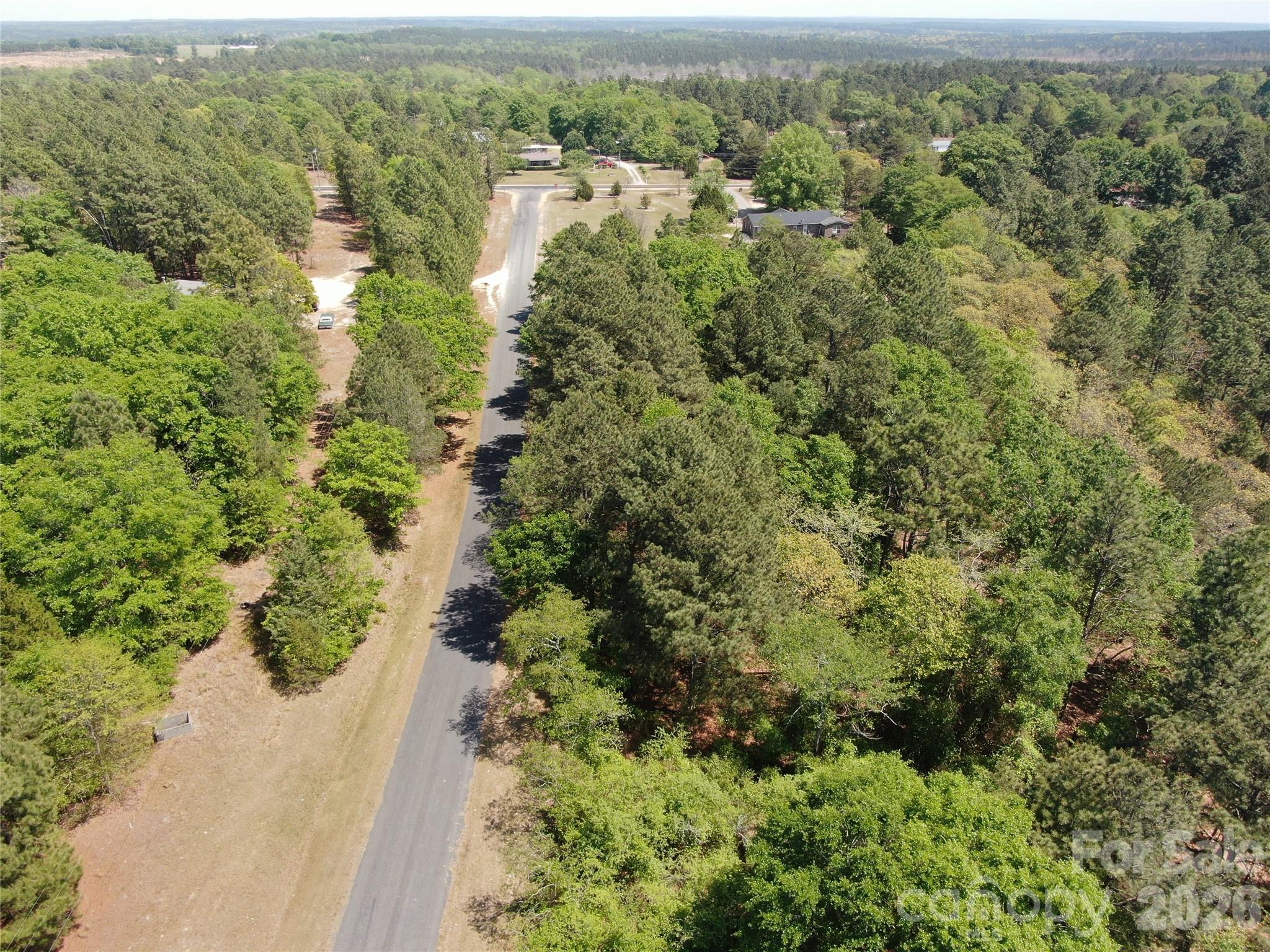 0 Leake Road Jackson Springs, NC 27281 - Photo 2 of 4 an aerial view of residential house with outdoor space and trees all around