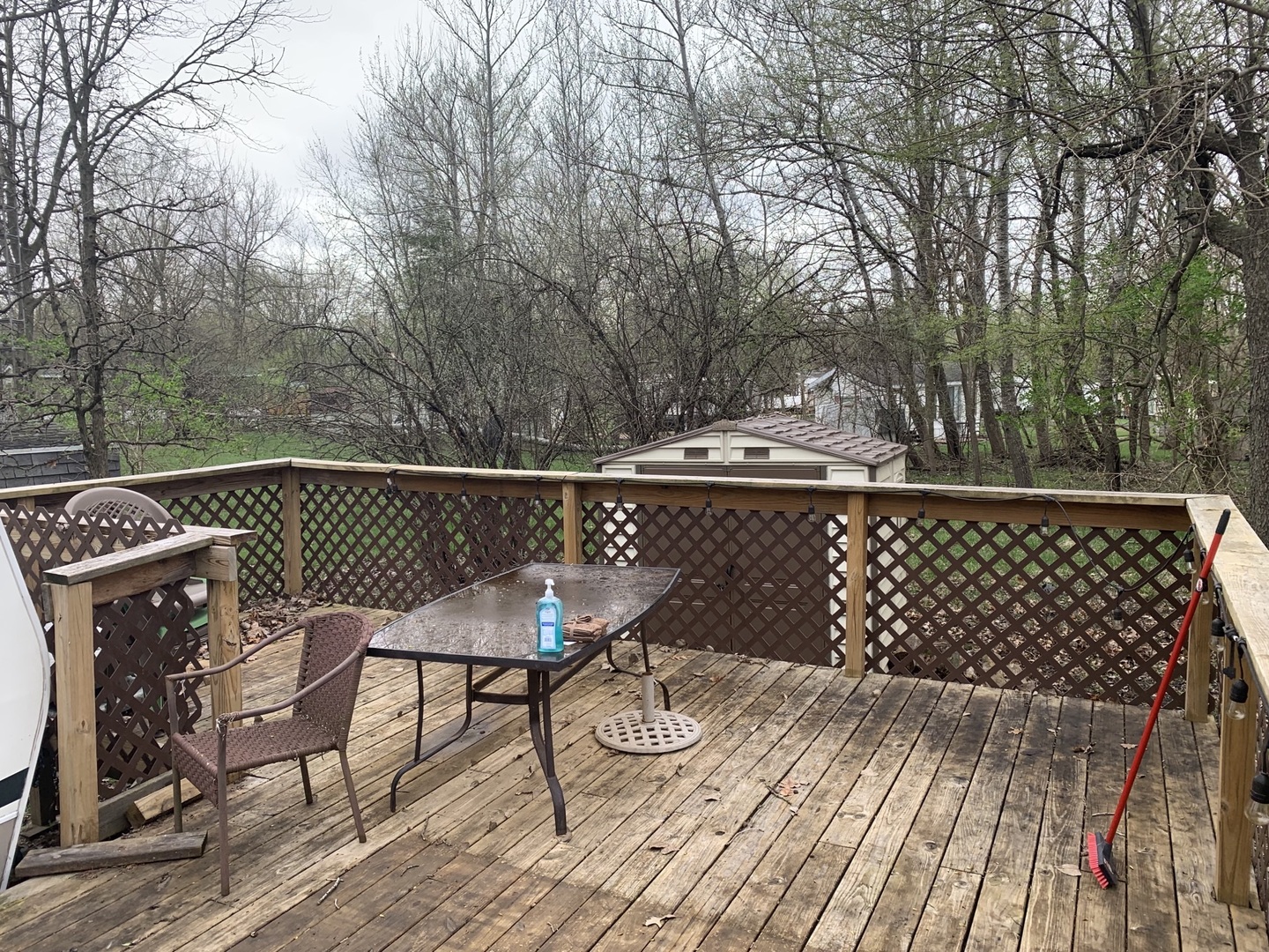 5-6 Woodhaven Sublette, IL 61367 - Photo 5 of 10 a view of a chairs and table on the deck