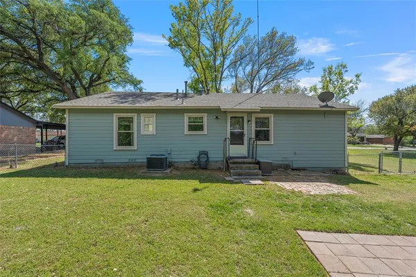 a view of a trees with a yard
