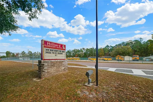 a view of a street with an trees