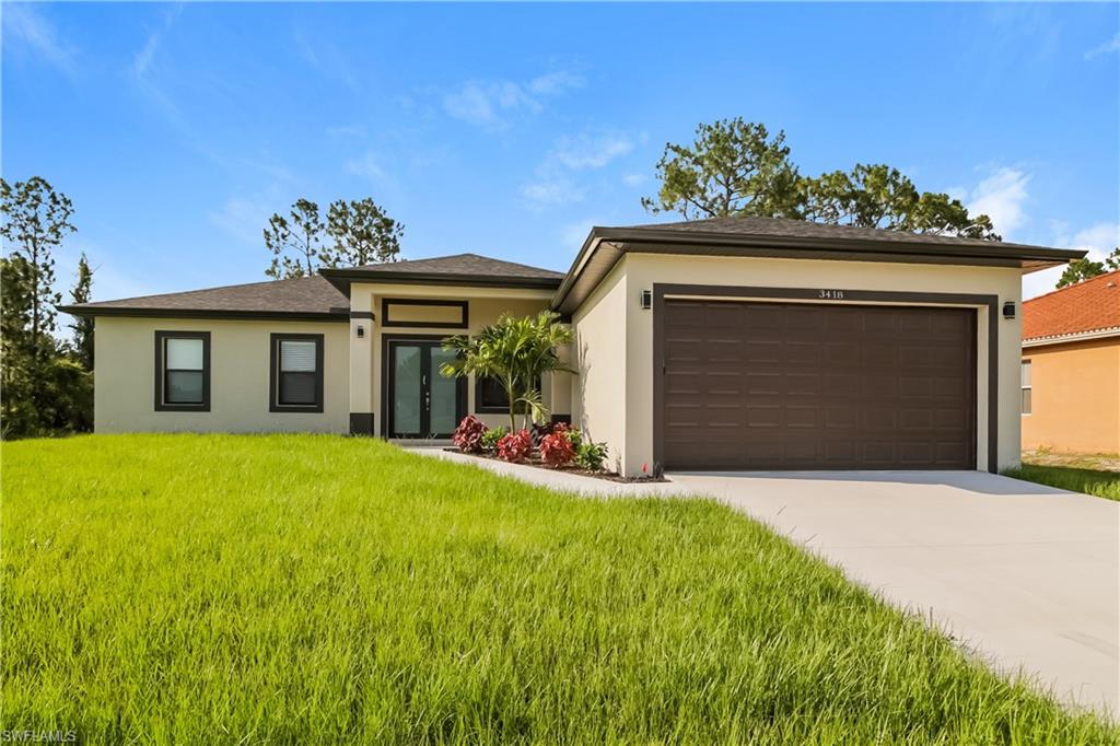 3418 4th Street Southwest Lehigh Acres, FL 33976 - Photo 1 of 15