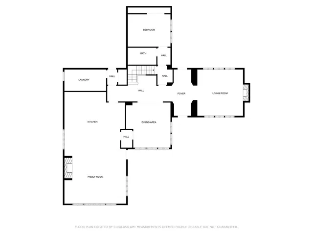 a view of a hallway with windows