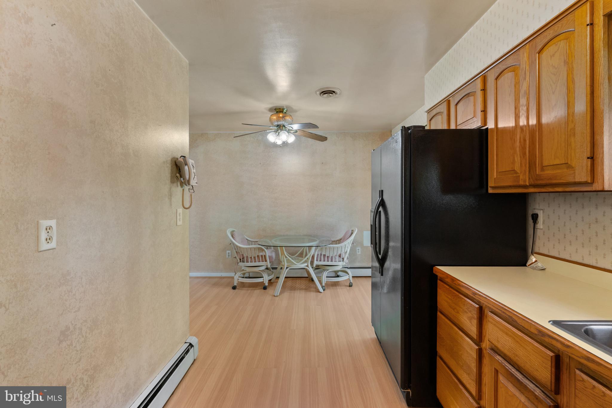 7959 Oak Road Pasadena, MD 21122 - Photo 7 of 37 Kitchen with view of Dining Room