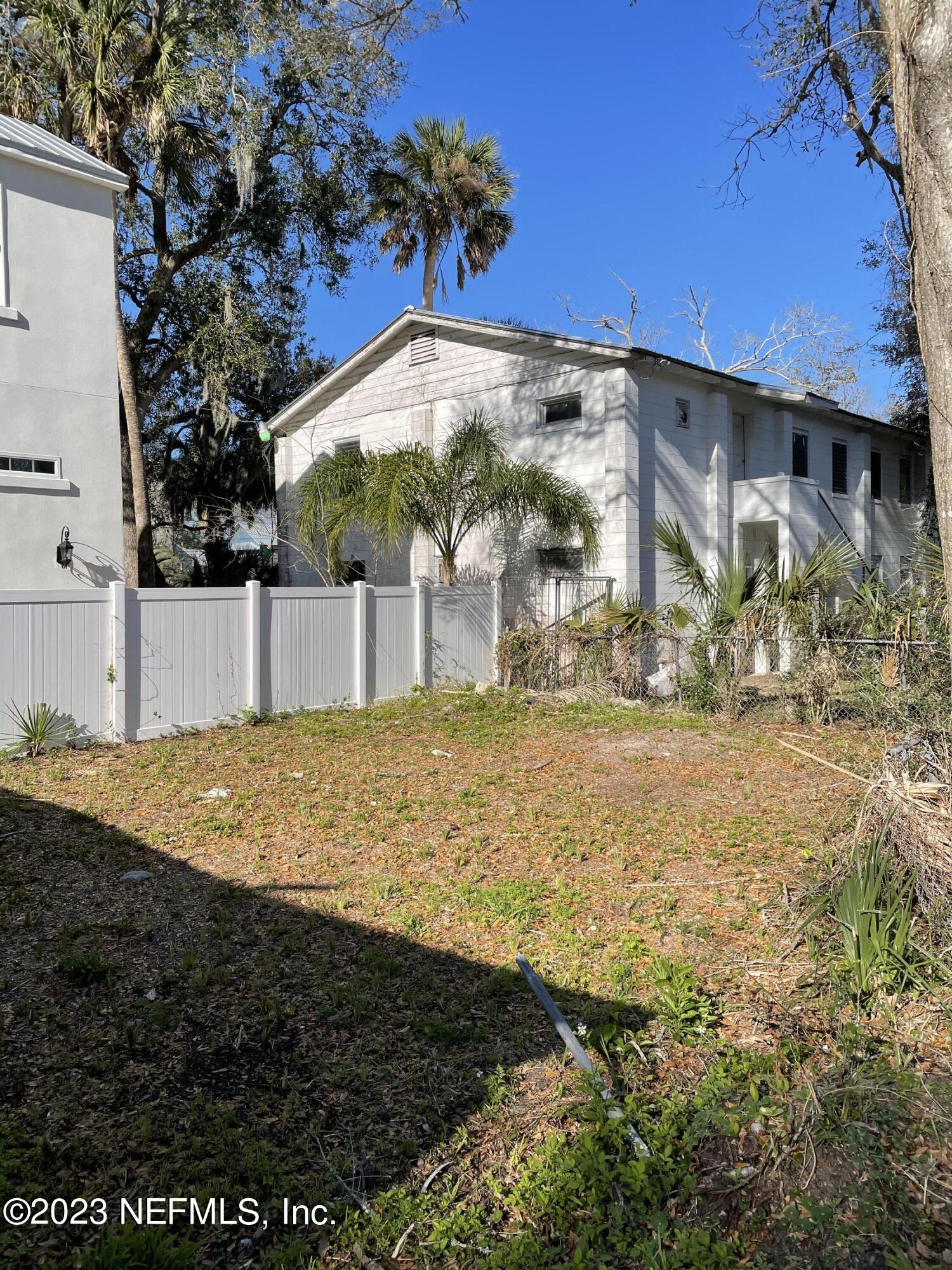 93 Oneida Street St. Augustine, FL 32084 - Photo 6 of 8 a view of a house with a yard
