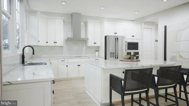 a kitchen with stainless steel appliances a sink and cabinets