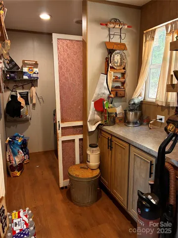 a room with a sink and a stove