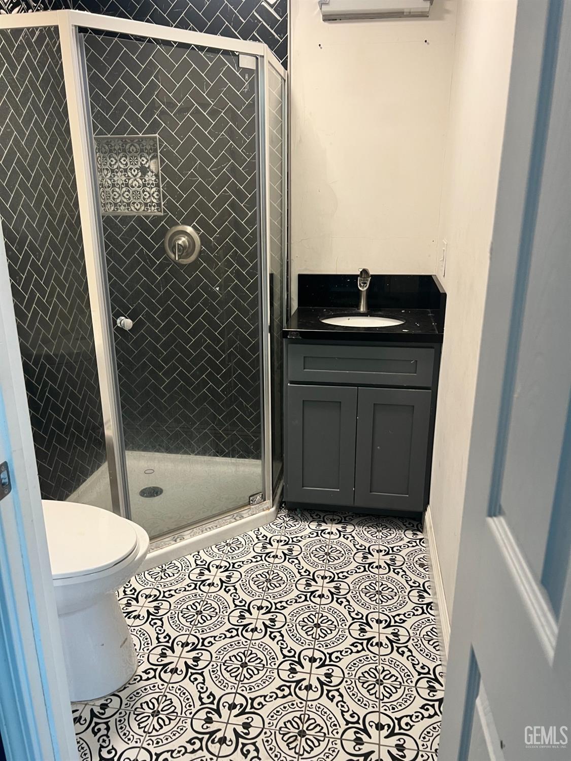 Undisclosed Address Taft, CA 93268 - Photo 4 of 10 a bathroom with a sink a toilet a shower and a mirror