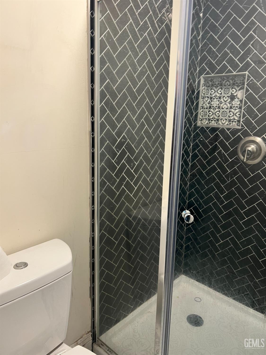 Undisclosed Address Taft, CA 93268 - Photo 5 of 10 a bathroom with a toilet and a shower