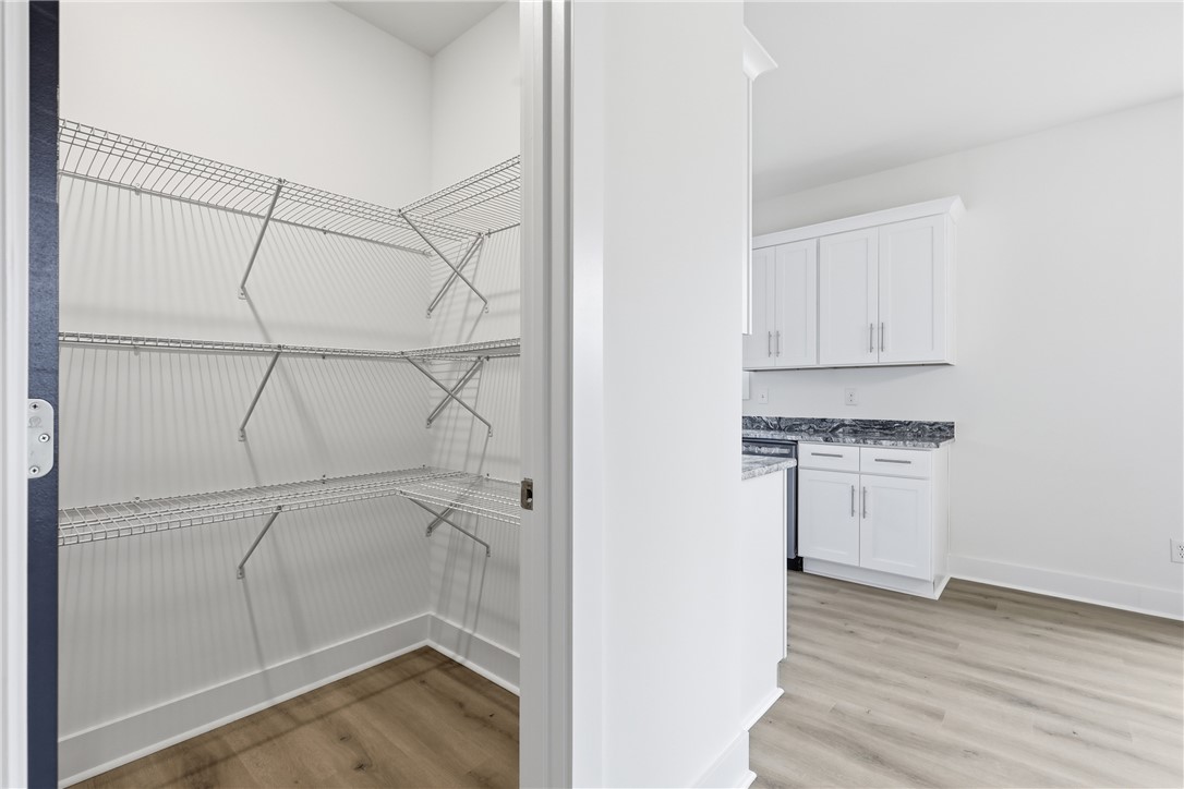 403 Tribble Street Seneca, SC 29678 - Photo 14 of 37 Discover abundant storage with an organized pantry, conveniently situated next to a well-appointed kitchen.