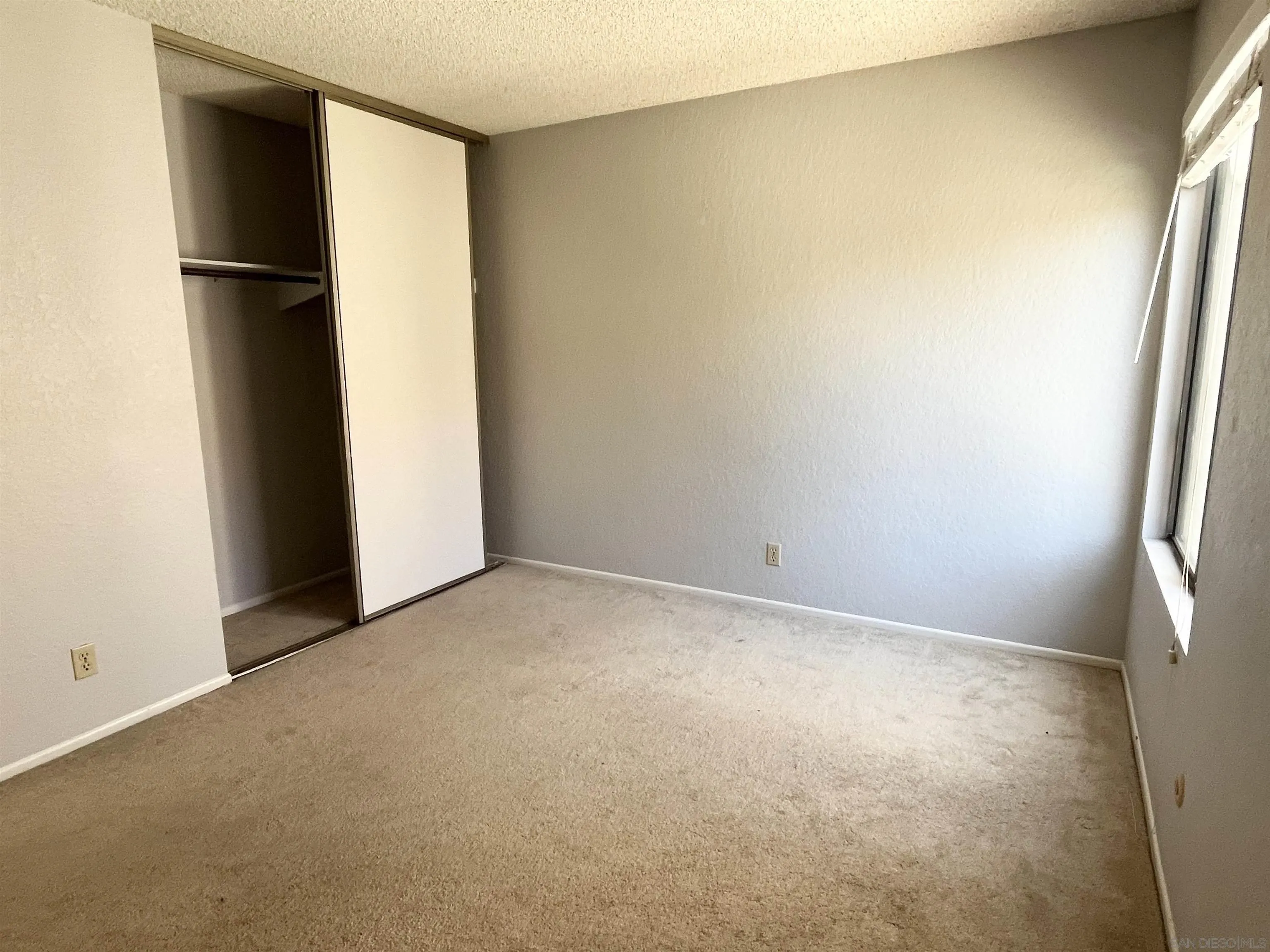 8365 Westmore Road, Unit 20 San Diego, CA 92126 - Photo 19 of 29 a view of empty room