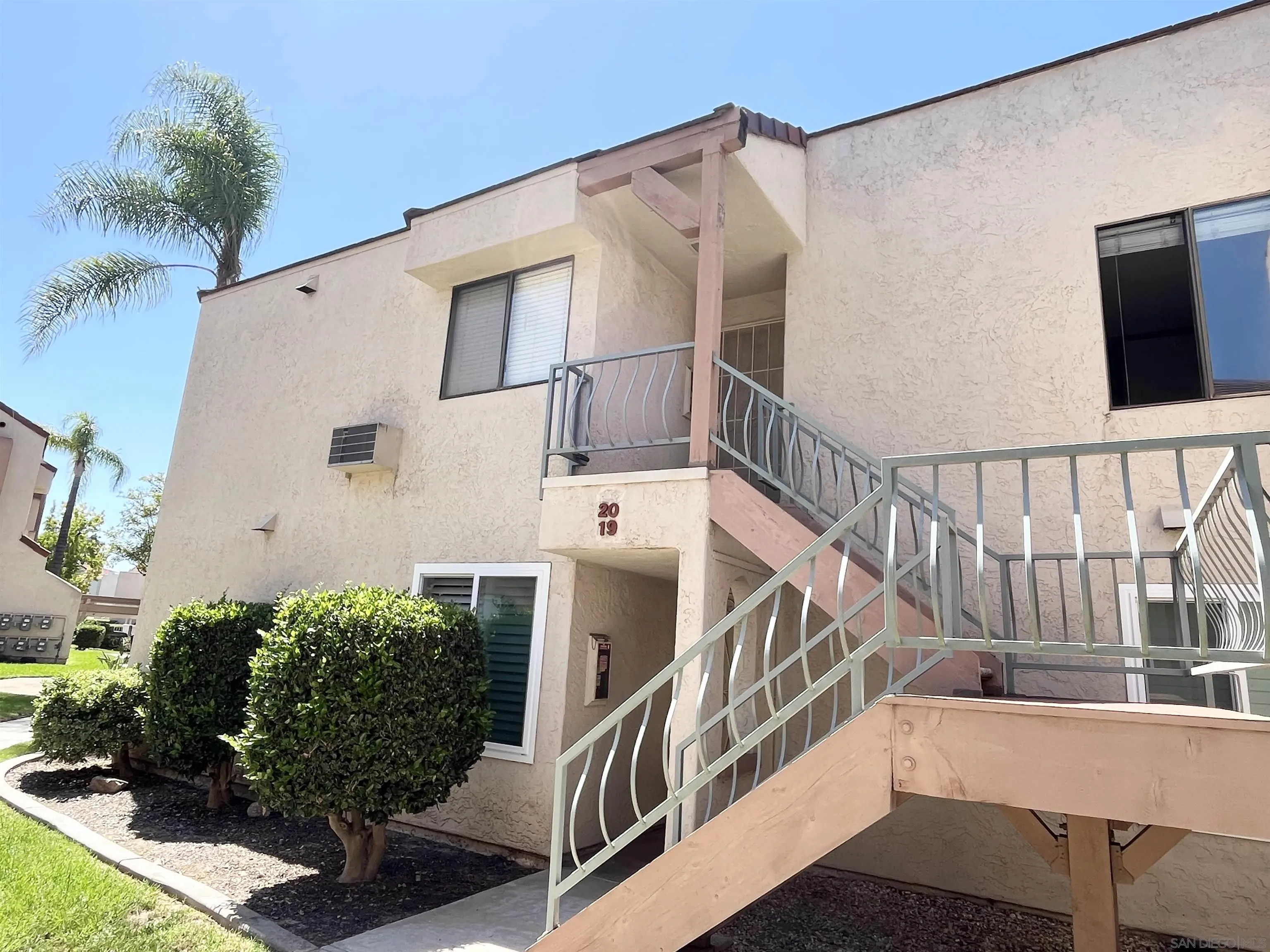 8365 Westmore Road, Unit 20 San Diego, CA 92126 - Photo 2 of 29 a view of balcony with wooden floor and seating space