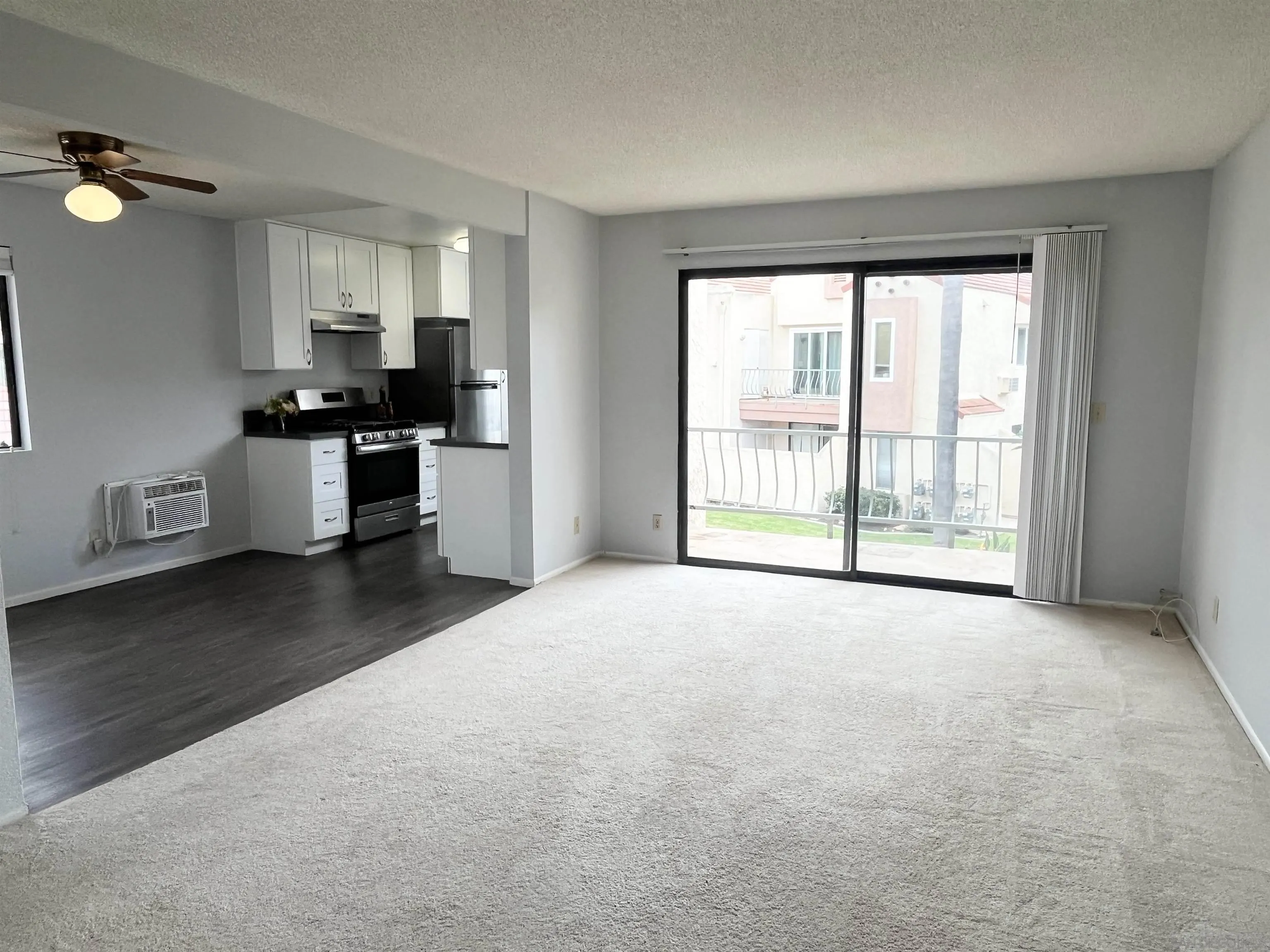 8365 Westmore Road, Unit 20 San Diego, CA 92126 - Photo 3 of 29 a view of an empty room with a window