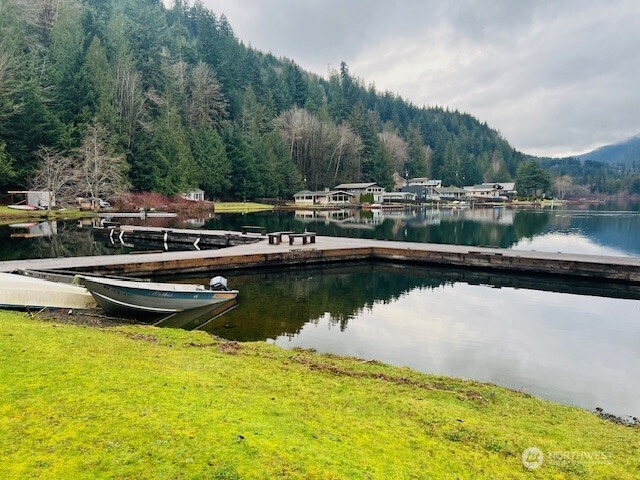 9999 Mallard Cove Road Port Angeles, WA 98363 - Photo 14 of 15 a view of a lake with houses