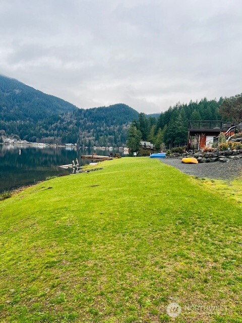 9999 Mallard Cove Road Port Angeles, WA 98363 - Photo 15 of 15 a view of a lake with houses in the back