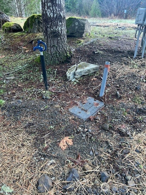 9999 Mallard Cove Road Port Angeles, WA 98363 - Photo 4 of 15 a backyard of a house with a yard and outdoor seating