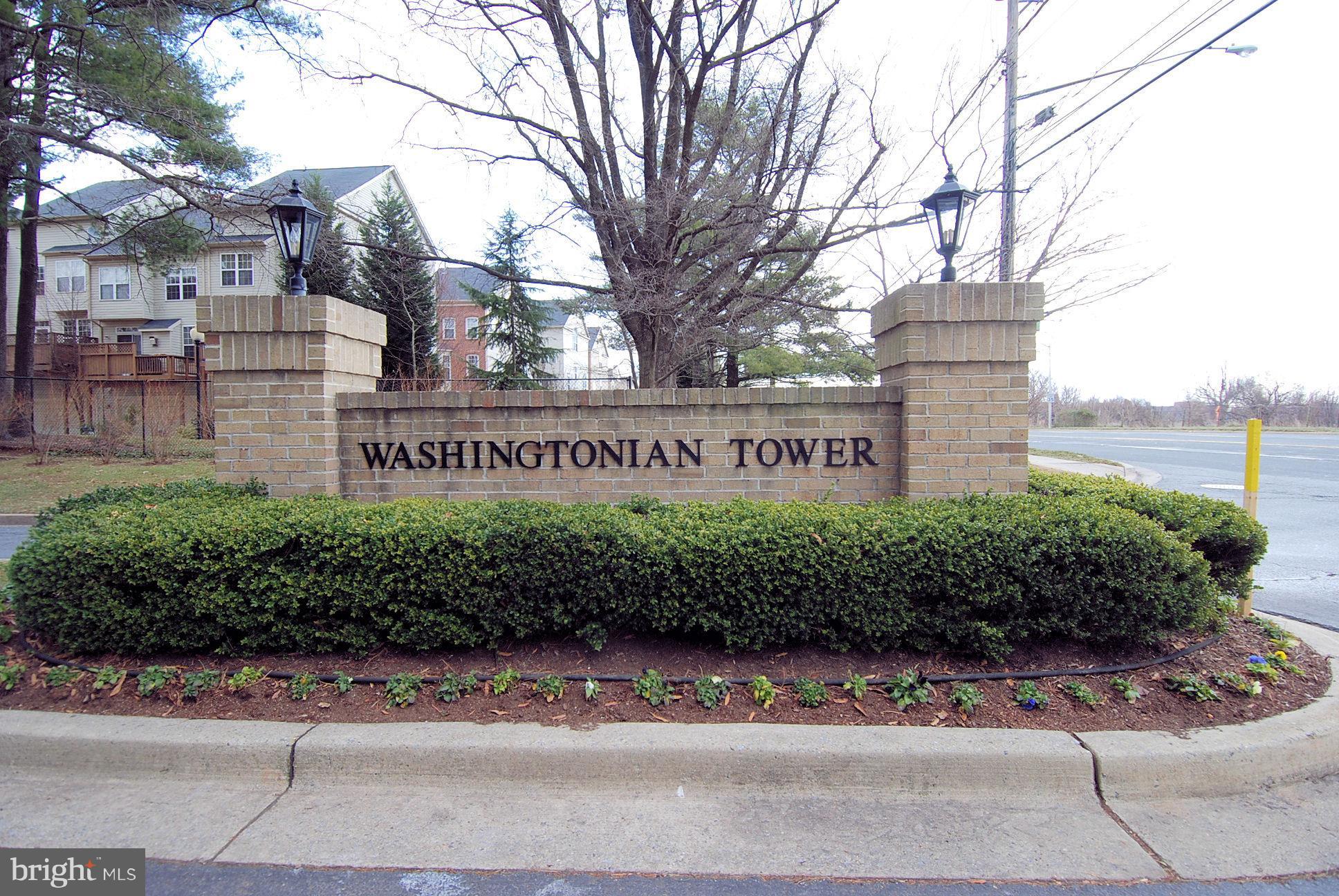 9701 Fields Road, Unit 1604 Gaithersburg, MD 20878 - Photo 19 of 30 a sign on the side of a building