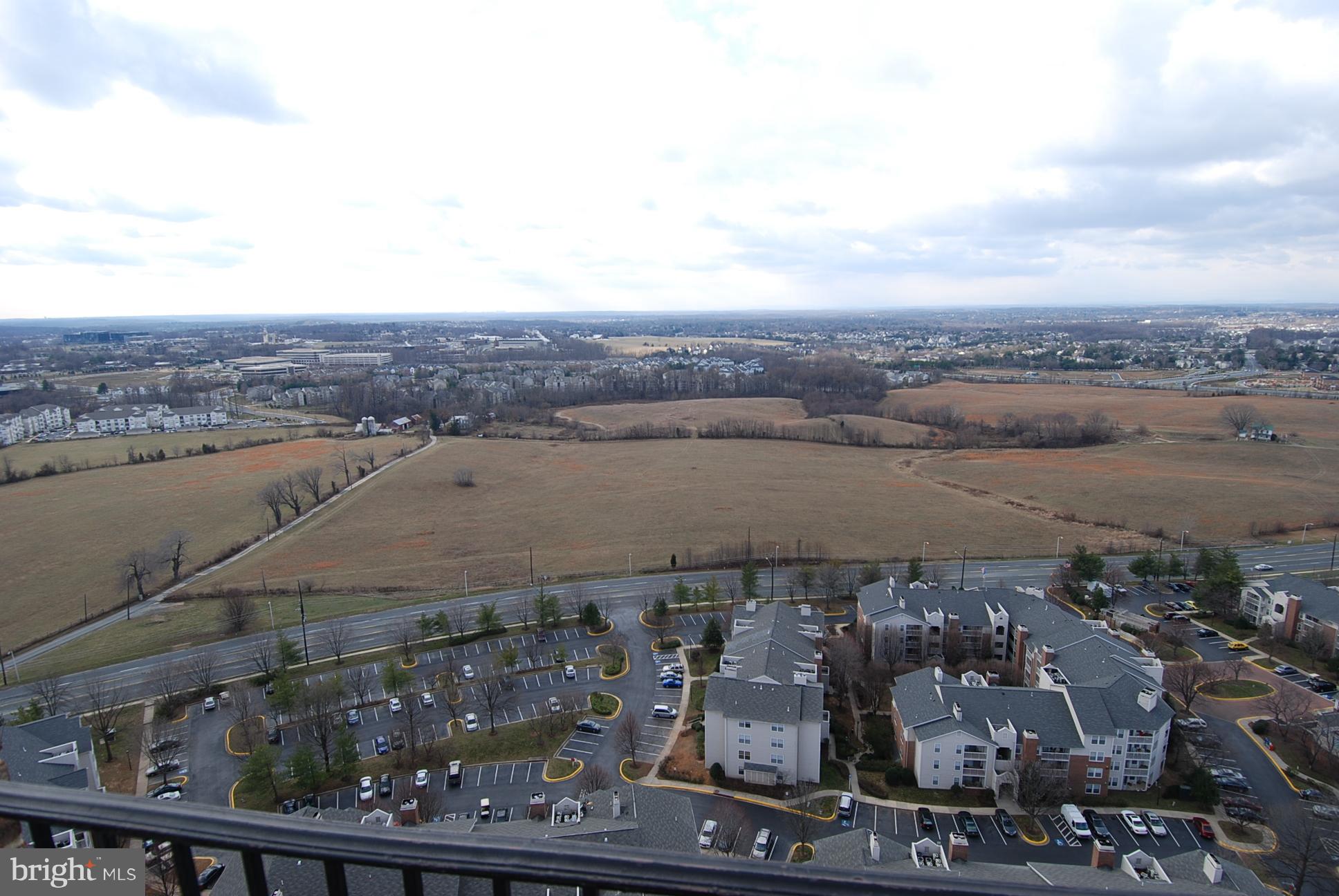 9701 Fields Road, Unit 1604 Gaithersburg, MD 20878 - Photo 27 of 30 a view of a city and a lake view