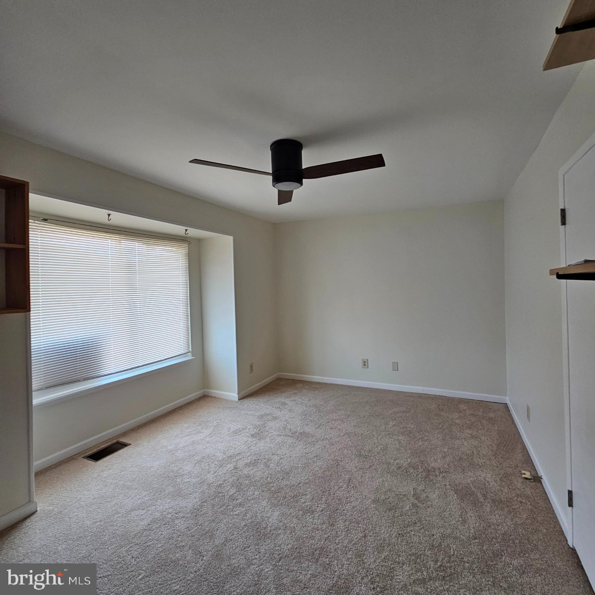 1808 Westwind Way, Unit 79 McLean, VA 22102 - Photo 13 of 24 an empty room with windows
