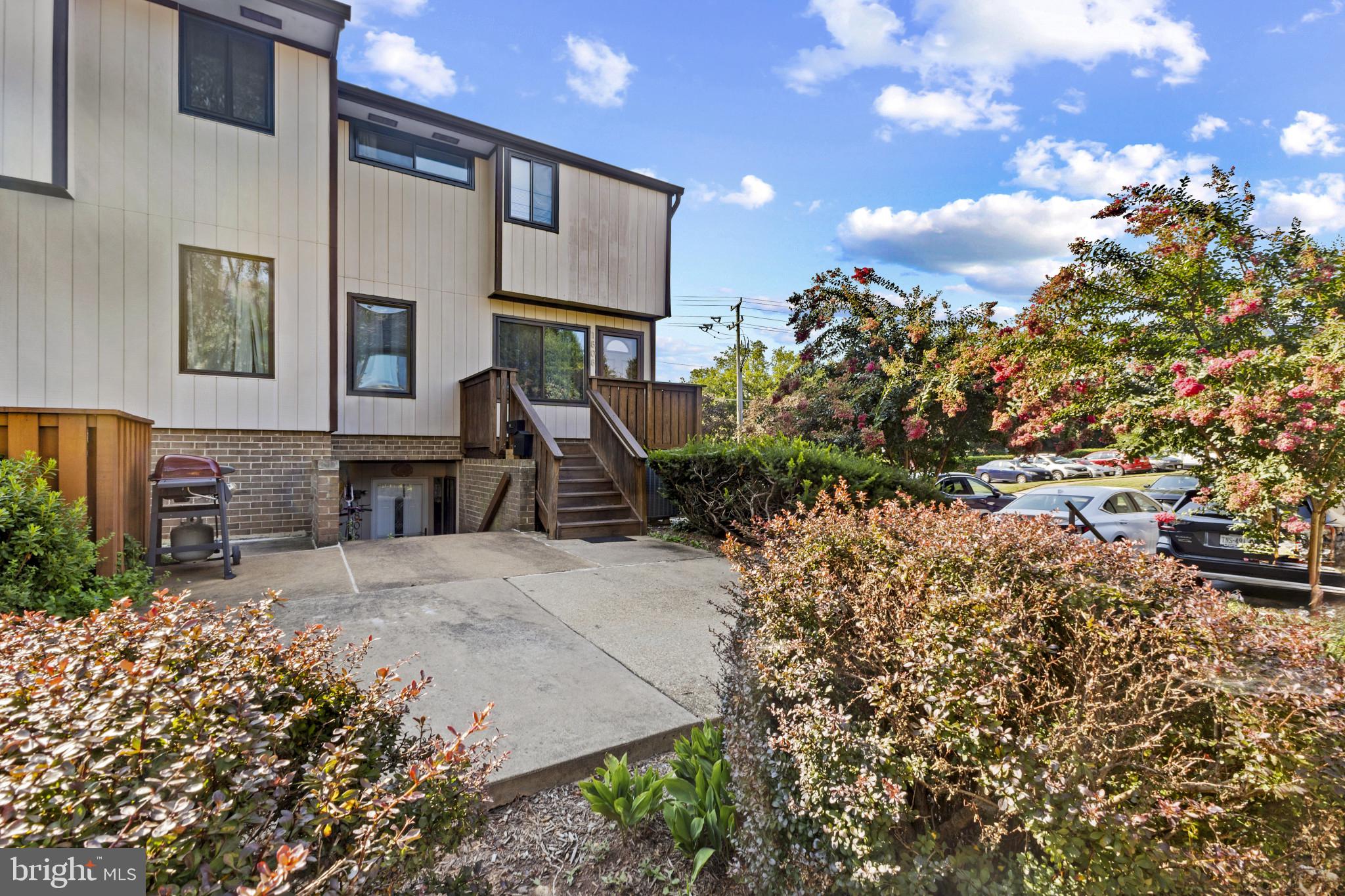 1808 Westwind Way, Unit 79 McLean, VA 22102 - Photo 2 of 24 a view of a house with a tree