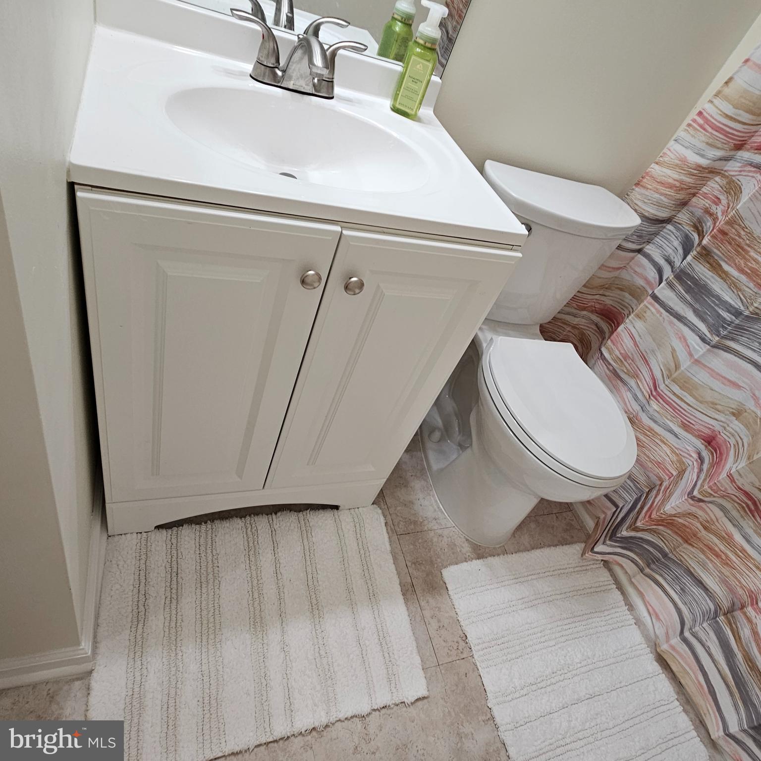1808 Westwind Way, Unit 79 McLean, VA 22102 - Photo 21 of 24 a bathroom with a toilet and a sink