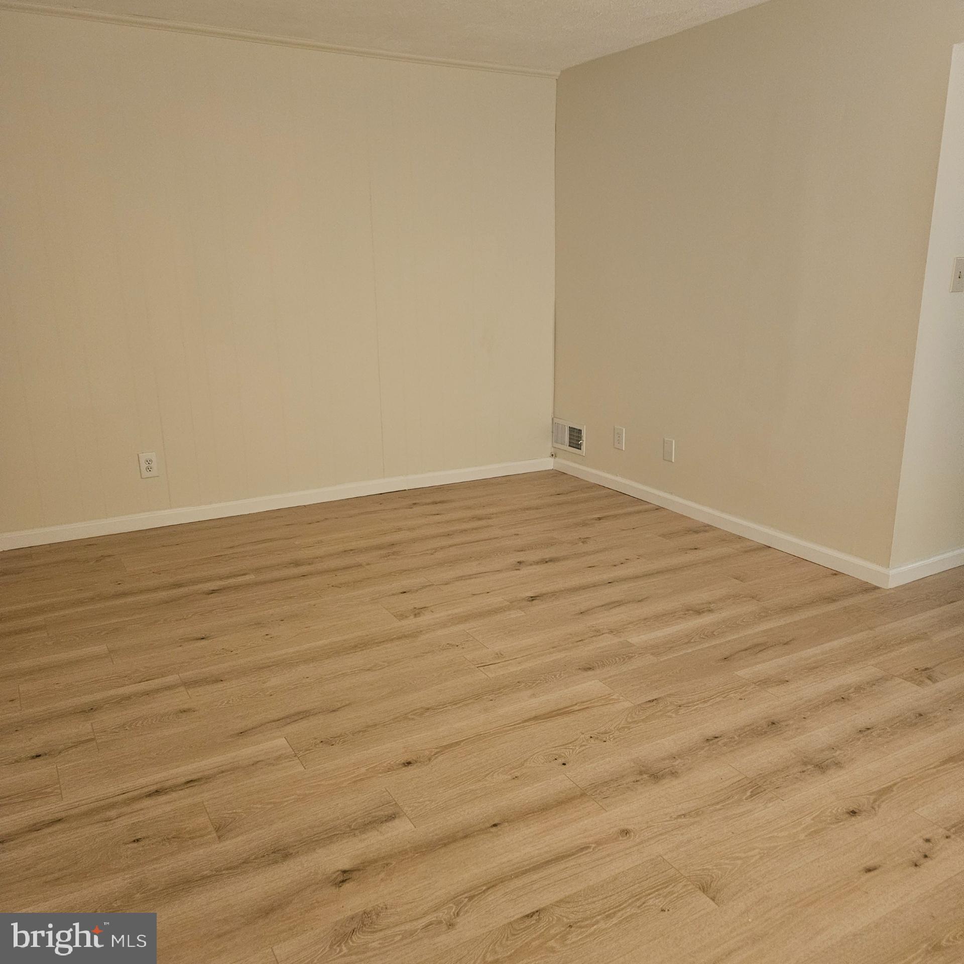1808 Westwind Way, Unit 79 McLean, VA 22102 - Photo 24 of 24 a view of an empty room with wooden floor